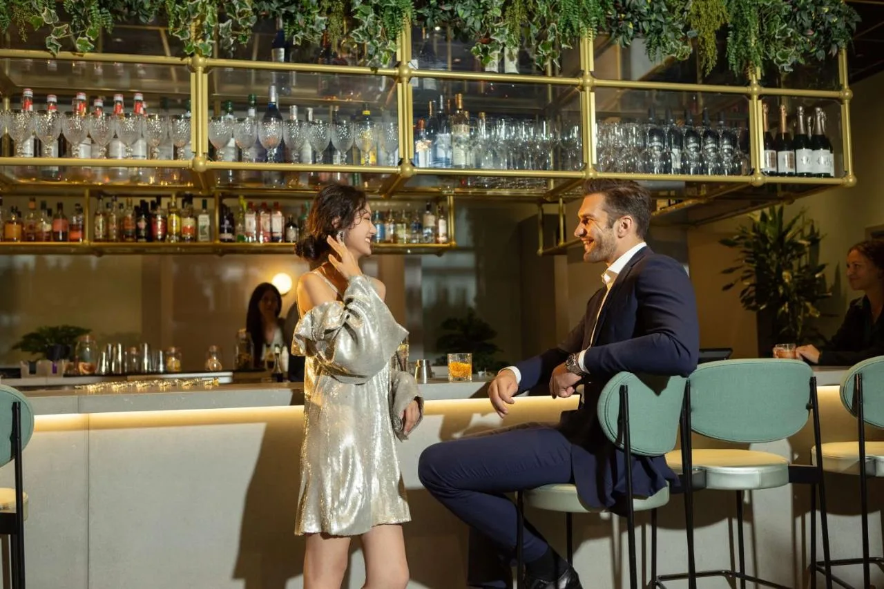 Guests at the bar inside YOTEL London City