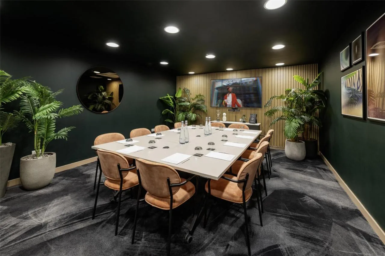 Conference room with long table at YOTEL London City